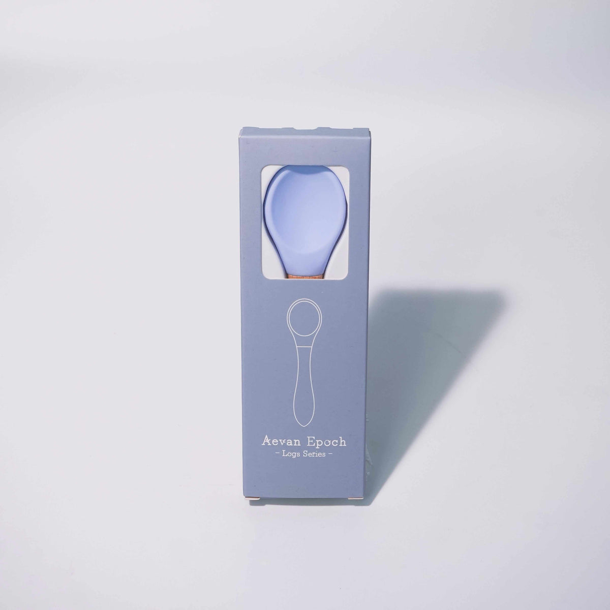 Beechwood Silicone Spoon with a pale blue silicone scoop and light wood handle, packaged in a blue box