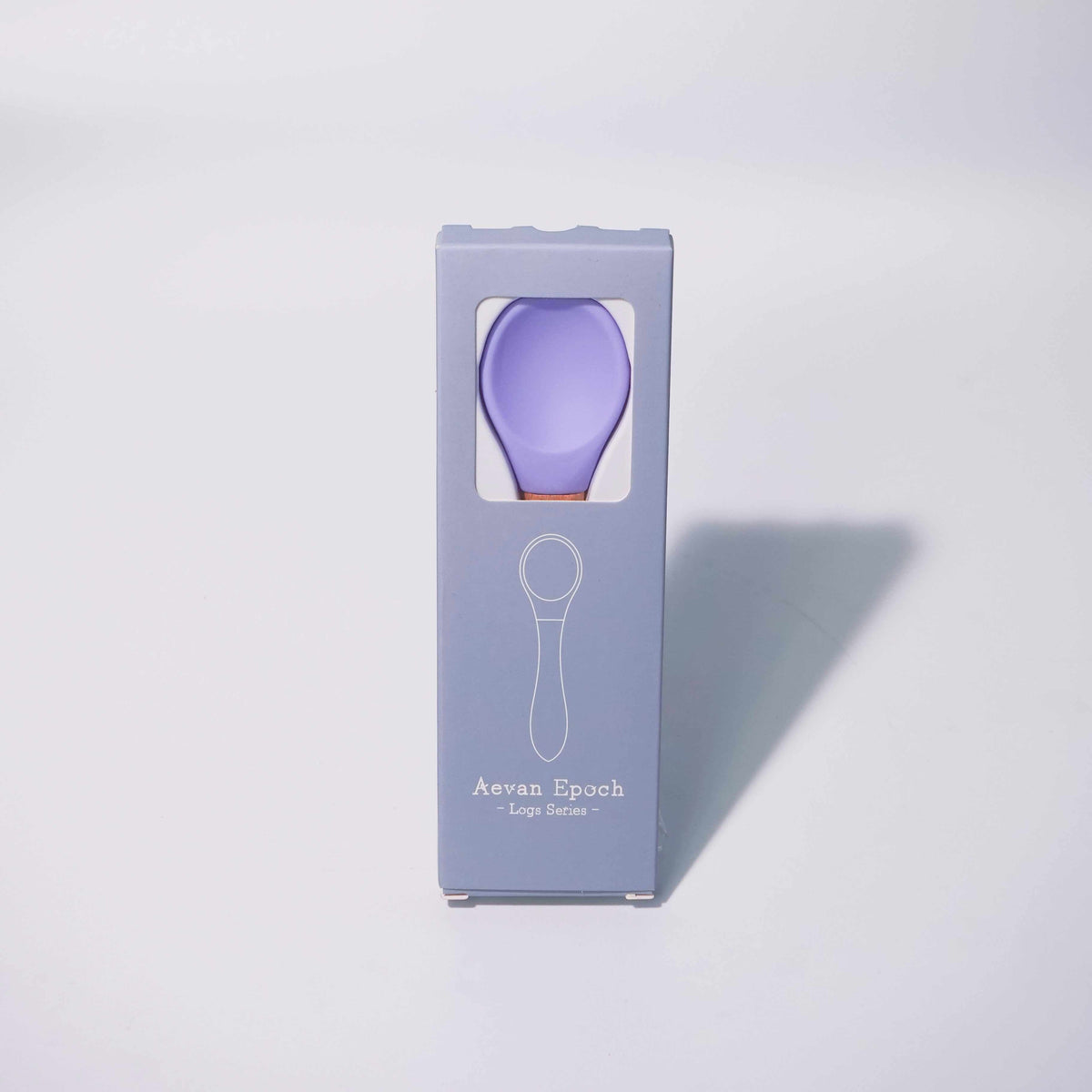 Beechwood Silicone Spoon featuring a smooth lavender silicone bowl and light wood handle, shown in its branded box