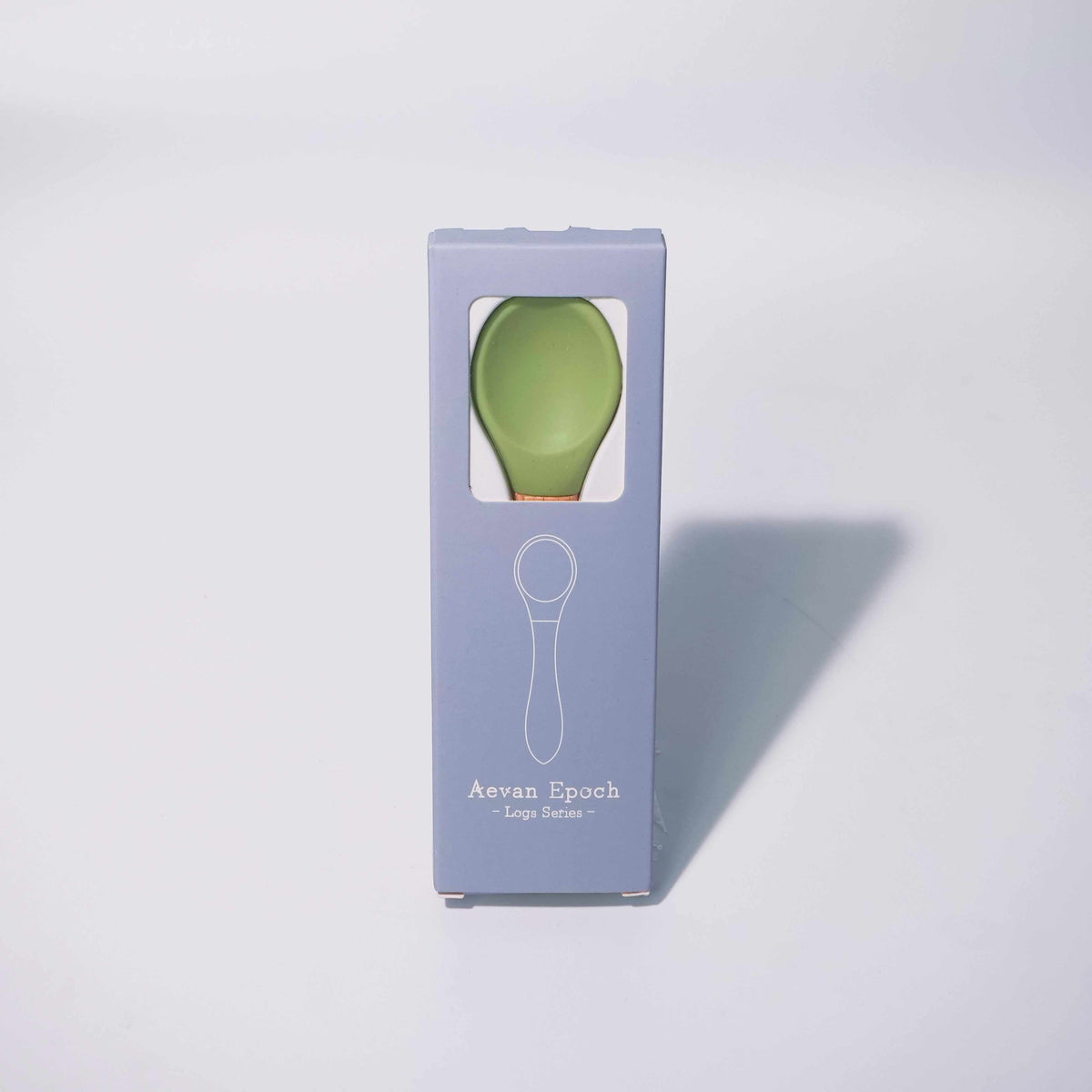 Beechwood Silicone Spoon in olive green silicone with a natural wood-toned handle, shown in a lavender box