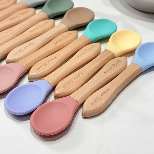 Beechwood Silicone Spoon with natural wooden handles and soft pastel silicone heads in assorted colours