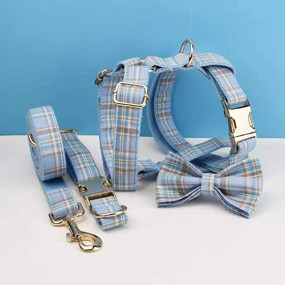 personalized no pull dog harness set in blue plaid fabric with matching collar, leash and bow tie, plus gold-tone hardware